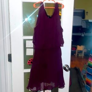 Maroon/Plum sleeveless dress.